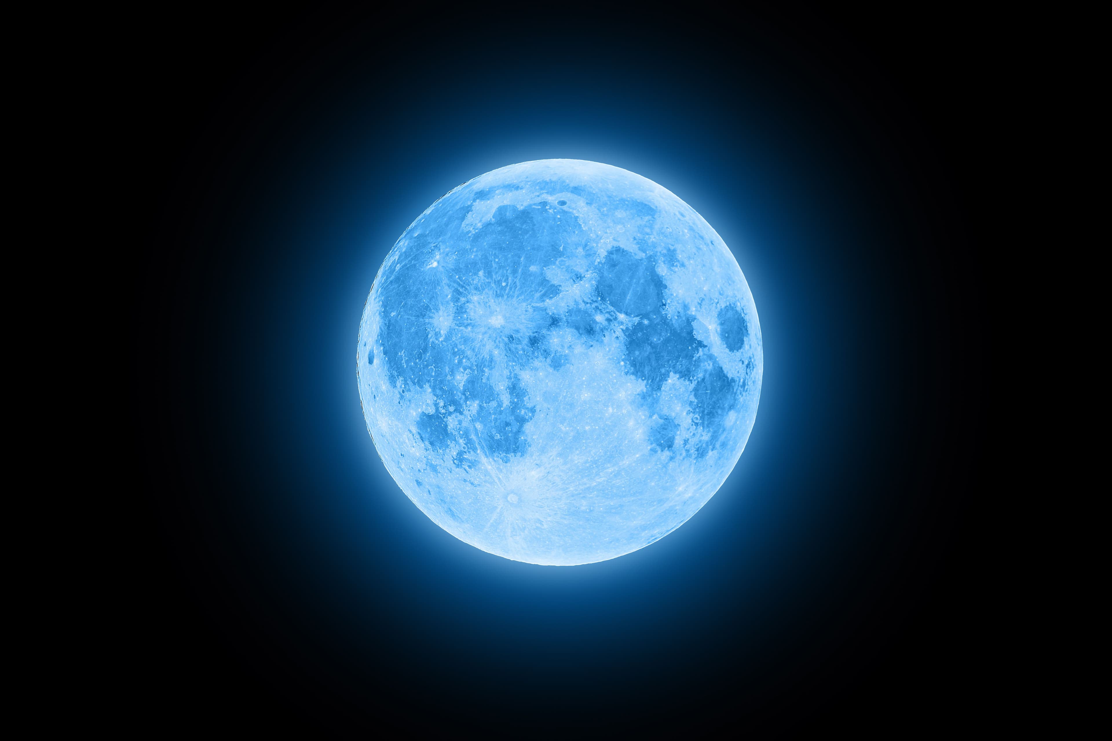 Blue super moon glowing with blue halo isolated on black background | Image Credit: © lukszczepanski - stock.adobe.com