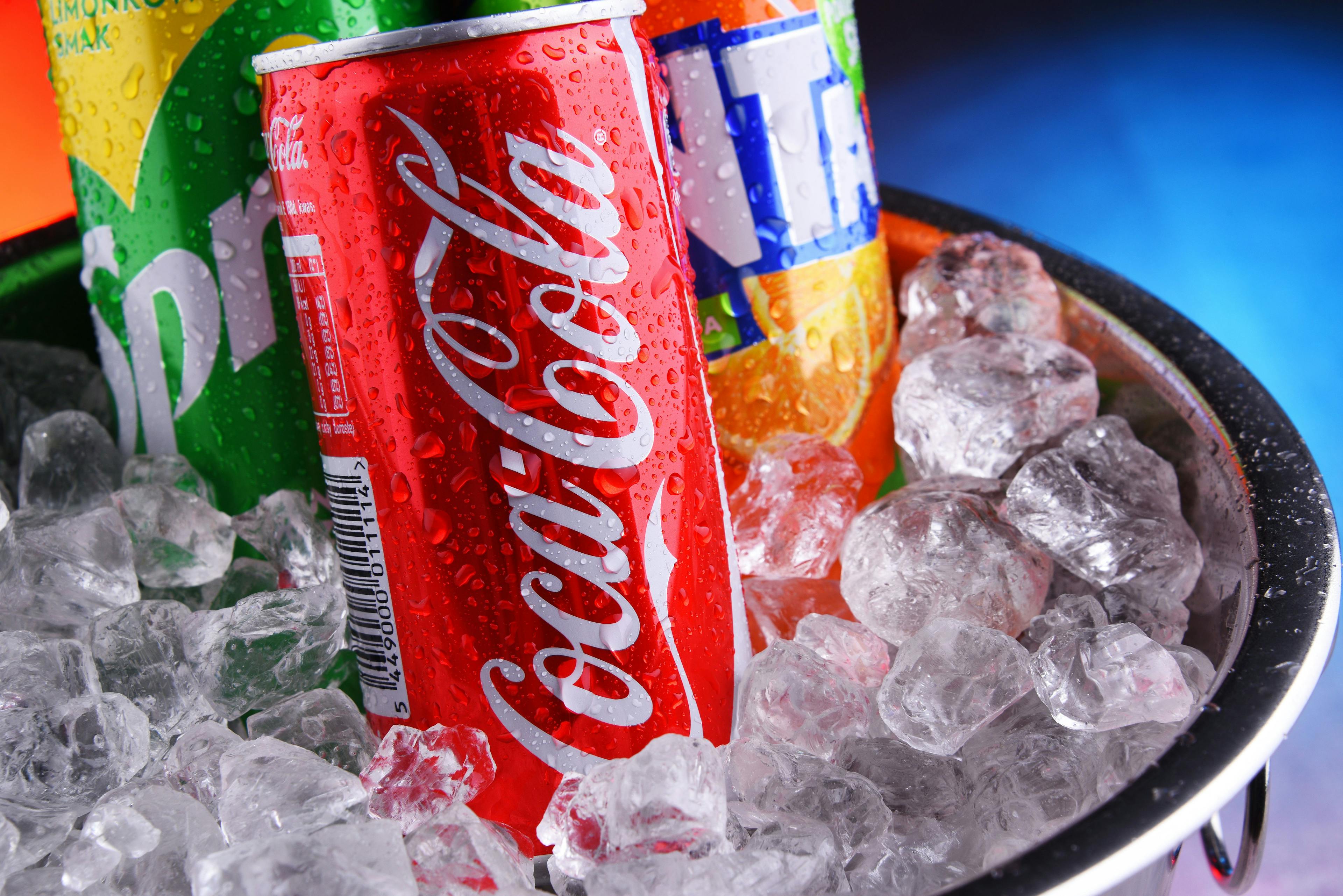 Cans of assorted Coca Cola Company soft drinks | Image Credit: © monticellllo - stock.adobe.com